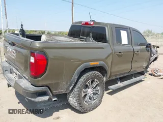 2023 GMC Canyon 4WD AT4 with VIN 1GTP6DEK5P1231432, listed as a IAAI auction lot 41785102 with 33,154 mi miles and . Bid and sale history available at carsss.com. Image 4.