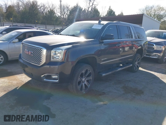 2015 GMC Yukon XL Denali with VIN 1GKS2JKJ9FR634771, listed as a IAAI auction lot 41676218 with 73,271 mi miles. Bid and sale history available at carsss.com. Image 17.