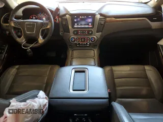 2015 GMC Yukon Denali with VIN 1GKS2CKJ7FR266750, listed as a Copart auction lot 47882125 with 121,705 mi miles and Salvage Title. Bid and sale history available at carsss.com. Image 8.