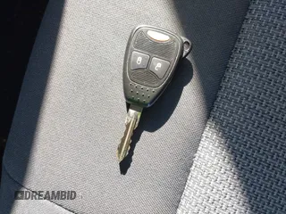 2009 Jeep Patriot Sport with VIN 1J4FT28B99D139661, listed as a IAAI auction lot 41644514 with 155,117 mi miles and . Bid and sale history available at DreamBid. Image 11.