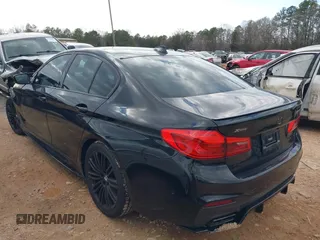 2019 BMW 5 Series M550i xDrive with VIN WBAJB9C56KB464957, listed as a IAAI auction lot 41729334 with Not provided miles and . Bid and sale history available at DreamBid. Image 3.