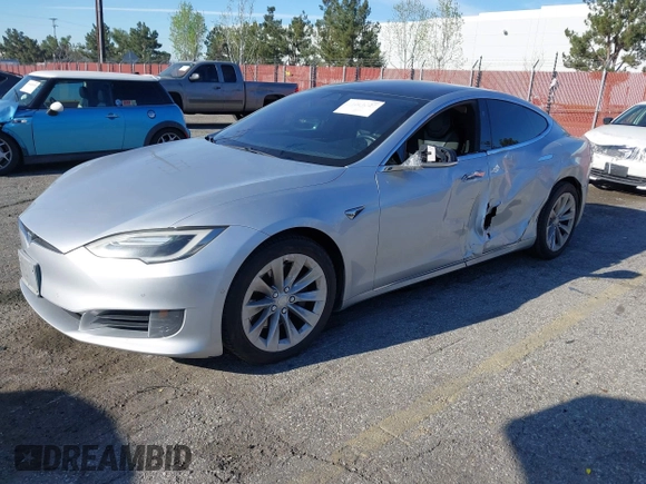 2017 Tesla Model S 60 with VIN 5YJSA1E12HF195741, listed as a IAAI auction lot 41861327 with 172,011 mi miles and . Bid and sale history available at DreamBid. Image 2.