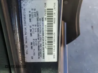 2014 Mazda 3 i Grand Touring with VIN JM1BM1M72E1212149, listed as a Copart auction lot 75026484 with 144,027 mi miles and Salvage Title. Bid and sale history available at DreamBid. Image 12.