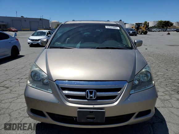 2005 Honda Odyssey EX-L with VIN 5FNRL38625B045152, listed as a Copart auction lot 57633005 with 145,776 mi miles and Salvage title. Bid and sale history available at DreamBid. Image 5.
