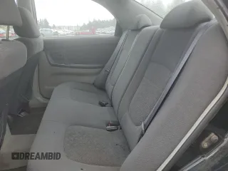 2005 Kia Spectra LX z VIN KNAFE121155165277, wystawiony jako Copart lot #55357155 z przebiegiem Nie podano mil oraz Czysty tytuł • Clean title. Historia ofert i sprzedaży dostępna na DreamBid. Obrazek 10.