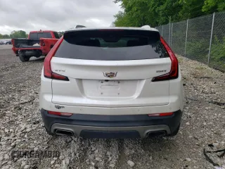 2021 Cadillac XT4 FWD Premium Luxury with VIN 1GYFZCR4XMF050649, listed as a Copart auction lot 58714445 with 33,233 mi miles and Non repairable. Bid and sale history available at DreamBid. Image 6.