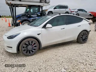 2022 Tesla Model Y Performance z VIN 7SAYGDEF9NF399909, wystawiony jako Copart lot #59620215 z przebiegiem 43 951 mil mil oraz Szkoda całkowita • Salvage title. Historia ofert i sprzedaży dostępna na DreamBid. Obrazek 1.