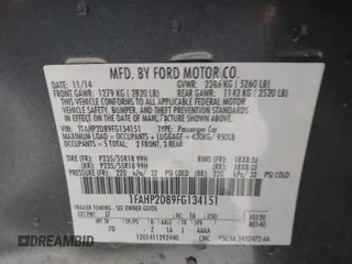 2015 Ford Taurus SE with VIN 1FAHP2D89FG134151, listed as a IAAI auction lot 41750681 with 102,348 mi miles and . Bid and sale history available at carsss.com. Image 9.