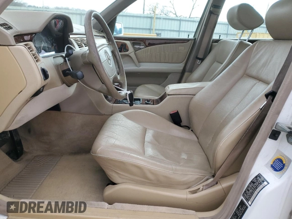 1998 Mercedes-Benz E-Class with VIN WDBJF65F4WA665505, listed as a Copart auction lot 42311695 with 389,016 mi miles and Salvage Title. Bid and sale history available at carsss.com. Image 7.