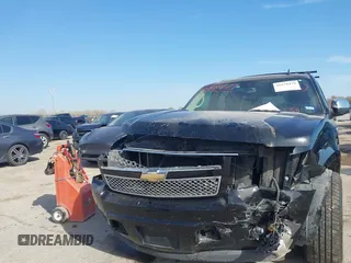 2011 Chevrolet Suburban LTZ with VIN 1GNSCKE03BR117338, listed as a IAAI auction lot 41878479 with 182,327 mi miles. Bid and sale history available at carsss.com. Image 6.