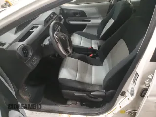 2014 Toyota Prius One z VIN JTDKDTB33E1558853, wystawiony jako Copart lot #57339425 z przebiegiem Nie podano mil oraz Nie do naprawy • Non repairable. Historia ofert i sprzedaży dostępna na DreamBid. Obrazek 7.