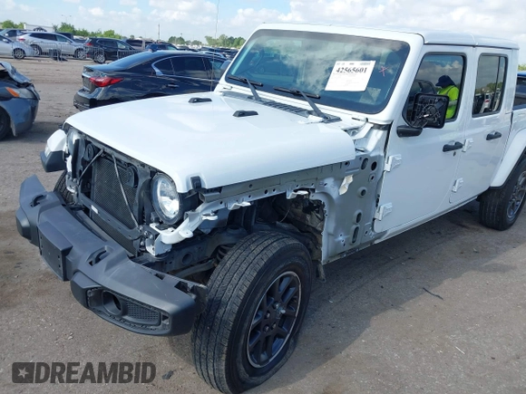 2020 Jeep Gladiator Overland z VIN 1C6HJTFGXLL180622, wystawiony jako IAAI lot #42565601 z przebiegiem 63 738 mil mil oraz . Historia ofert i sprzedaży dostępna na DreamBid. Obrazek 6.