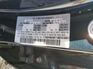 2017 Mazda CX-3 Touring z VIN JM1DKDC74H0165654, wystawiony jako Copart lot #41928295 z przebiegiem 173 567 mil mil oraz Szkoda całkowita • Salvage title. Historia ofert i sprzedaży dostępna na DreamBid. Obrazek 13.