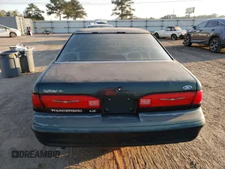 1995 Ford Thunderbird LX z VIN 1FALP62W0SH186954, wystawiony jako Copart lot #77611114 z przebiegiem 75 550 mil mil oraz Czysty tytuł • Clean title. Historia ofert i sprzedaży dostępna na DreamBid. Obrazek 6.