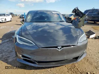 2019 Tesla Model S 100D z VIN 5YJSA1E47KF341410, wystawiony jako Copart lot #58707445 z przebiegiem Nie podano mil oraz Szkoda całkowita • Salvage title. Historia ofert i sprzedaży dostępna na DreamBid. Obrazek 5.