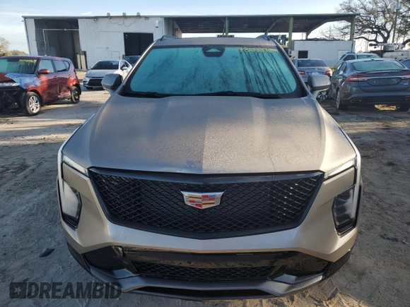 2024 Cadillac XT4 FWD Sport with VIN 1GYFZER49RF240140, listed as a Copart auction lot 78022704 with 401 mi miles and Salvage title. Bid and sale history available at DreamBid. Image 5.