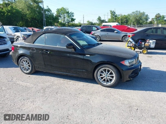 2011 BMW 1 Series 128i with VIN WBAUL7C55BVM81049, listed as a IAAI auction lot 41892811 with 50,659 mi miles and . Bid and sale history available at carsss.com. Image 1.