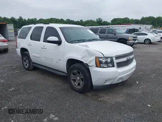 2007 Chevrolet Tahoe LTZ with VIN 1GNFK13007J149042, listed as a IAAI auction lot 42593189 with 216,791 mi miles and . Bid and sale history available at DreamBid. Image 1.