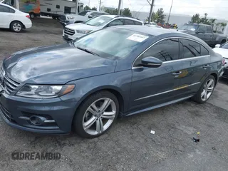 2013 Volkswagen CC Sport with VIN WVWBP7AN3DE571837, listed as a IAAI auction lot 41784447 with 156,834 mi miles. Bid and sale history available at carsss.com. Image 17.