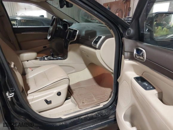 2014 Jeep Grand Cherokee Overland with VIN 1C4RJFCGXEC162109, listed as a IAAI auction lot 41943979 with 147,788 mi miles. Bid and sale history available at carsss.com. Image 5.