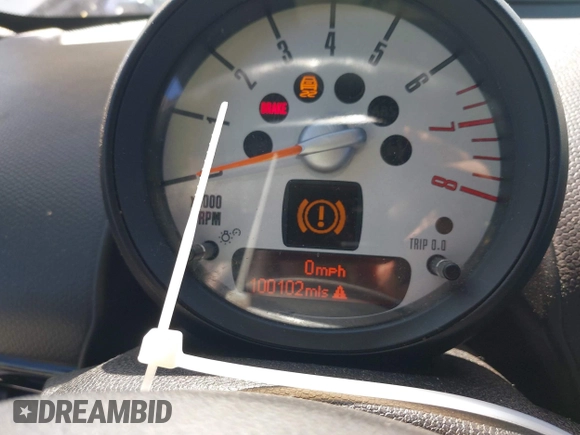 2012 MINI Countryman S with VIN WMWZC5C54CWM11869, listed as a IAAI auction lot 42265935 with 100,102 mi miles and . Bid and sale history available at DreamBid. Image 7.