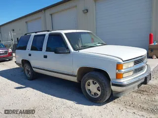 1996 Chevrolet Tahoe Limited with VIN 1GNEC13R0TJ309292, listed as a IAAI auction lot 41412643 with 219,815 mi miles. Bid and sale history available at carsss.com. Image 1.