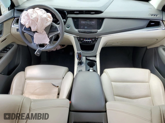 2017 Cadillac XT5 Luxury FWD с VIN 1GYKNBRS0HZ150007, выставлен на аукционе Copart как лот 54745505 с пробегом 37 271 миль миль и Списание • Salvage title. История ставок и продаж доступна на DreamBid. Изображение 8.