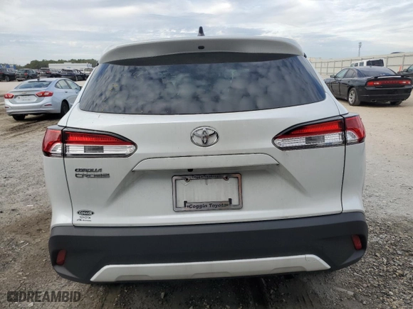2022 Toyota Corolla Cross L with VIN 7MUAAAAG1NV019878, listed as a Copart auction lot 84089094 with 13,474 mi miles and Salvage Title. Bid and sale history available at carsss.com. Image 6.