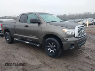 2011 Toyota Tundra 4WD Truck with VIN 5TFUM5F12BX018755, listed as a IAAI auction lot 41558136 with 154,327 mi miles. Bid and sale history available at carsss.com. Image 1.