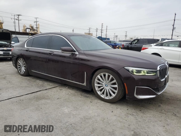 2020 BMW 7 Series 740i with VIN WBA7T2C04LCD14332, listed as a Copart auction lot 48348235 with 68,401 mi miles and Salvage title. Bid and sale history available at DreamBid. Image 4.