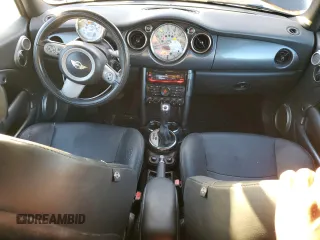 2007 MINI Convertible with VIN WMWRF33597TG16707, listed as a Copart auction lot 79104014 with 113,380 mi miles and Salvage Title. Bid and sale history available at DreamBid. Image 8.