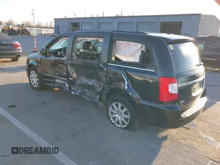 2014 Chrysler Town & Country Touring with VIN 2C4RC1BGXER124367, listed as a IAAI auction lot 41888366 with 143,638 mi miles and . Bid and sale history available at DreamBid. Image 3.