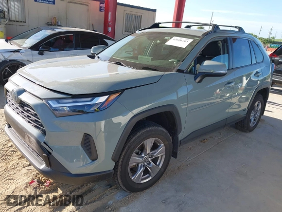 2022 Toyota RAV4 Hybrid XLE with VIN JTMRWRFV9NJ054668, listed as a IAAI auction lot 42606261 with 61,794 mi miles and . Bid and sale history available at DreamBid. Image 2.