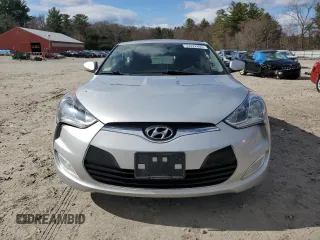 2013 Hyundai Veloster w/Black Int z VIN KMHTC6AD6DU121277, wystawiony jako Copart lot #53222805 z przebiegiem 155 236 mil mil oraz Czysty tytuł • Clean title. Historia ofert i sprzedaży dostępna na DreamBid. Obrazek 5.