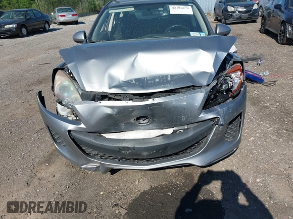 2013 Mazda 3 i Touring z VIN JM1BL1LP2D1742494, wystawiony jako IAAI lot #42186275 z przebiegiem 150 046 mil mil oraz . Historia ofert i sprzedaży dostępna na DreamBid. Obrazek 11.