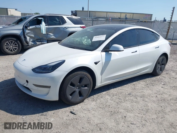 2022 Tesla Model 3 Long Range with VIN 5YJ3E1EB1NF116850, listed as a IAAI auction lot 42062677 with 48,744 mi miles and . Bid and sale history available at DreamBid. Image 2.