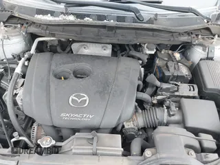 2016 Mazda CX-5 Sport z VIN JM3KE4BY1G0711602, wystawiony jako IAAI lot #42537627 z przebiegiem Nie podano mil oraz . Historia ofert i sprzedaży dostępna na DreamBid. Obrazek 10.