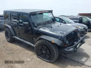 2012 Jeep Wrangler Unlimited Sport with VIN 1C4BJWDG3CL200826, listed as a IAAI auction lot 42261113 with 135,554 mi miles and . Bid and sale history available at DreamBid. Image 1.