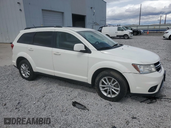 2013 Dodge Journey SXT with VIN 3C4PDDBG1DT619798, listed as a Copart auction lot 51820685 with 209,404 mi miles and Salvage Title. Bid and sale history available at DreamBid. Image 4.