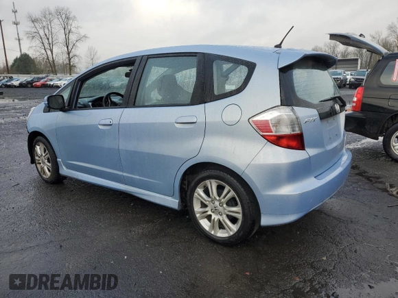 2009 Honda Fit Sport w/Navi with VIN JHMGE886X9S042490, listed as a Copart auction lot 86179244 with 109,130 mi miles and Salvage Title. Bid and sale history available at carsss.com. Image 2.