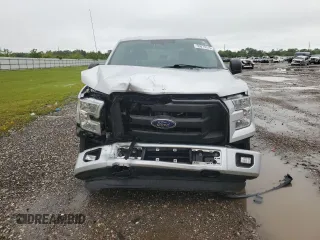 2015 Ford F-150 XLT with VIN 1FTEW1EP2FKD75675, listed as a Copart auction lot 55873515 with 163,367 mi miles and Salvage title. Bid and sale history available at DreamBid. Image 5.