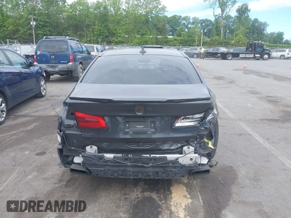 2018 BMW 5 Series M550i xDrive with VIN WBAJB9C56JB035364, listed as a IAAI auction lot 42179145 with 112,123 mi miles and . Bid and sale history available at DreamBid. Image 17.