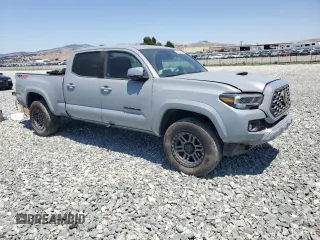 2020 Toyota Tacoma SR5 with VIN 3TMDZ5BN1LM087471, listed as a Copart auction lot 63074925 with 28,489 mi miles and Salvage title. Bid and sale history available at DreamBid. Image 4.