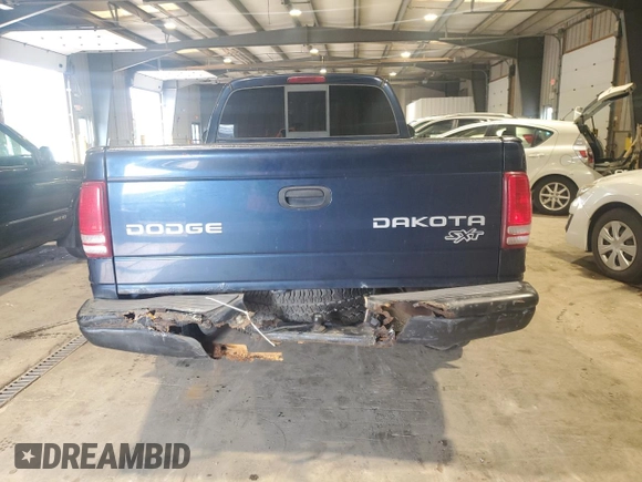 2004 Dodge Dakota z VIN 1D7GG16KX4S586053, wystawiony jako Copart lot #60221585 z przebiegiem 150 150 mil mil oraz Szkoda całkowita • Salvage title. Historia ofert i sprzedaży dostępna na DreamBid. Obrazek 6.