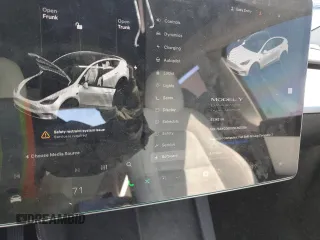 2022 Tesla Model Y Long Range z VIN 7SAYGDEEXNF455766, wystawiony jako Copart lot #49641685 z przebiegiem 51 142 mil mil oraz Szkoda całkowita • Salvage title. Historia ofert i sprzedaży dostępna na DreamBid. Obrazek 9.