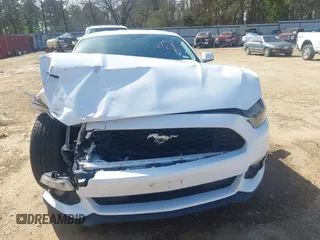 2016 Ford Mustang V6 with VIN 1FA6P8AM7G5278239, listed as a IAAI auction lot 41796124 with 127,829 mi miles and . Bid and sale history available at carsss.com. Image 6.