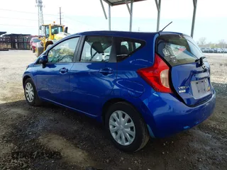 2014 Nissan Note SV with VIN 3N1CE2CP9EL424521, listed as a IAAI auction lot 42053853 with 166,740 mi miles and . Bid and sale history available at DreamBid. Image 3.