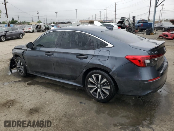 2023 Honda Civic EX z VIN 2HGFE1F72PH312995, wystawiony jako Copart lot #57284305 z przebiegiem 7 921 mil mil oraz Szkoda całkowita • Salvage title. Historia ofert i sprzedaży dostępna na DreamBid. Obrazek 2.