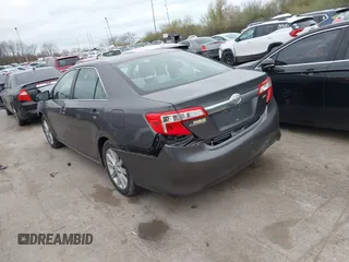 2014 Toyota Camry L with VIN 4T4BF1FK6ER364253, listed as a IAAI auction lot 42011773 with 87,051 mi miles. Bid and sale history available at carsss.com. Image 3.
