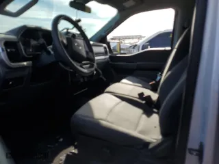 2021 Ford F-150 XL with VIN 1FTFW1E83MFB80686, listed as a Copart auction lot 52386125 with 156,582 mi miles and Salvage Title. Bid and sale history available at carsss.com. Image 7.